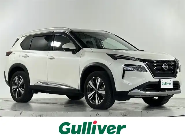 日産 エクストレイル G e－4ORCE 佐賀県 2023(令5)年 2.4万km ブリリアントホワイトパール 純正12.3インチナビ/フルセグTV/Bluetooth/Applecarplay/Androidauto/全方位カメラ　/衝突被害軽減システム/プロパイロット/レーダークルーズコントロール/レーンアシスト/ヘッドアップディスプレイ/ブラインドスポットモニター/デジタルインナールームミラー/自動駐車システム/ダウンヒルアシストコントロール/ロードサインアシスト/クリアランスソナー/オートライト/オートマチックハイビーム/LEDヘッドライト/LEDフォグライト/電動パーキング/オートブレーキホールド/純正ナビ連動型前後ドライブレコーダー/ビルトインETC2.0/4WD/パワーバックドア/ステアリングヒーター/運転席・助手席・後席シートヒーター/運転席・助手席パワーシート/合皮シート/メモリーシート/ISOFIX対応/ワイヤレス充電器/後席サンシェード/純正フロアマット/純正19インチアルミホイール