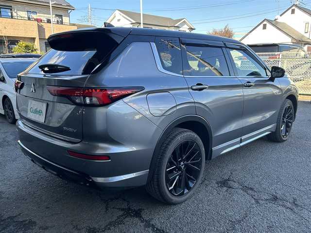 三菱 アウトランダー ＰＨＥＶ ブラックエディション 鹿児島県 2023(令5)年 0.3万km チタニウムグレーメタリック プッシュスタートキー/純正ナビ/・ナビゲーションディスプレイ/・USB/WI-FIナビ/・TV(フル)/・Bluetooth/・AM/・FM/フロント/サイド/バックカメラ/アラウンドビューモニター/ブレーキオートホールド/パワーバックドア/D席パワーシート/D/ N席シートヒーター/ドライブモード/プリクラッシュ/追従クルーズコントロール/コーナーセンサー/パドルシフト/アイドリングストップ/QI