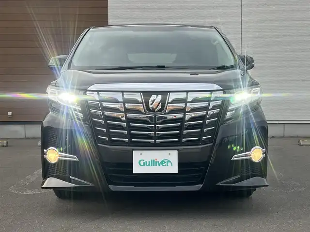 トヨタ アルファード S 秋田県 2015(平27)年 15.5万km スパークリングブラックパールクリスタルシャイン ４WD/両側パワスラ/LEDヘッドライト/社外ナビ/フルセグ/バックカメラ/社外アルミ/スマートキー/アイドリングストップ/コーナーセンサー/パーキングアシスト/プッシュスタート/ステアリングスイッチ/MTモード付AT/フリップダウンモニター/ドライブレコーダー/ETC/純正フロアマット/純正ドアバイザー/寒冷地仕様/オートライト/ダブルオートエアコン/横滑り防止/電動格納ウィンカーミラー