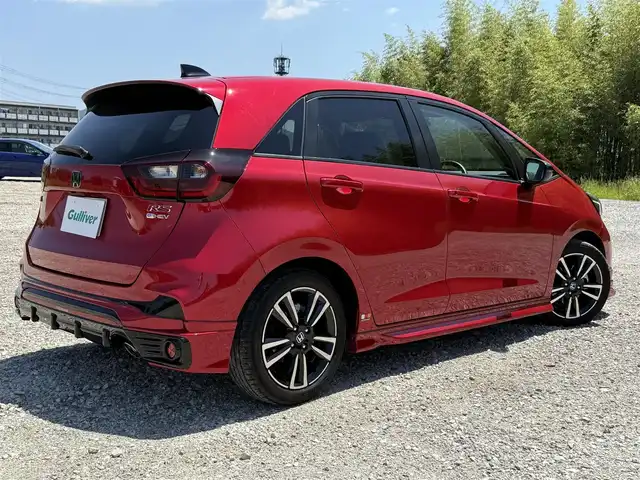ホンダ フィット e:HEV RS 兵庫県 2023(令5)年 2.6万km プレミアムクリスタルレッドM 無限エアロ(F/S/RU)/純正9インチナビ/バックカメラ/フルセグTV/ビルトインETC/ハーフレザーシート