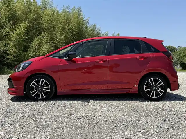 ホンダ フィット e:HEV RS 兵庫県 2023(令5)年 2.6万km プレミアムクリスタルレッドM 無限エアロ(F/S/RU)/純正9インチナビ/バックカメラ/フルセグTV/ビルトインETC/ハーフレザーシート