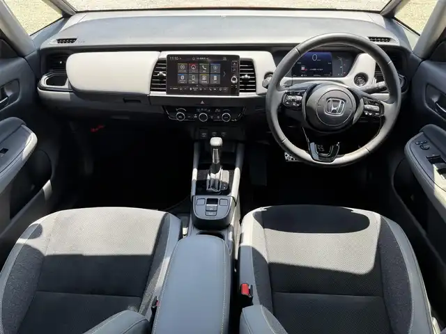 ホンダ フィット e:HEV RS 兵庫県 2023(令5)年 2.6万km プレミアムクリスタルレッドM 無限エアロ(F/S/RU)/純正9インチナビ/バックカメラ/フルセグTV/ビルトインETC/ハーフレザーシート