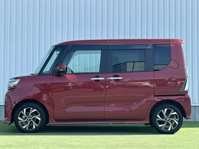 ダイハツ タント カスタム X 香川県 2023(令5)年 0.7万km ファイアークォーツレッドM 登録時走行距離：6138km/スマートアシスト/→衝突回避支援ブレーキ/→車線逸脱警報機能/→先行車発進お知らせ機能/純正7型ナビ/→ＣＤ／ＤＶＤ/→フルセグTV/バックカメラ/両側パワースライドドア/ハーフレザーシート/前席シートヒーター/ステアリングリモコン/LEDヘッドライト/オートライト/ドライブレコーダー/純正14インチアルミホイール/純正フロアマット/スマートキー/プッシュスタート/電動格納ウィンカーミラー/バイザー