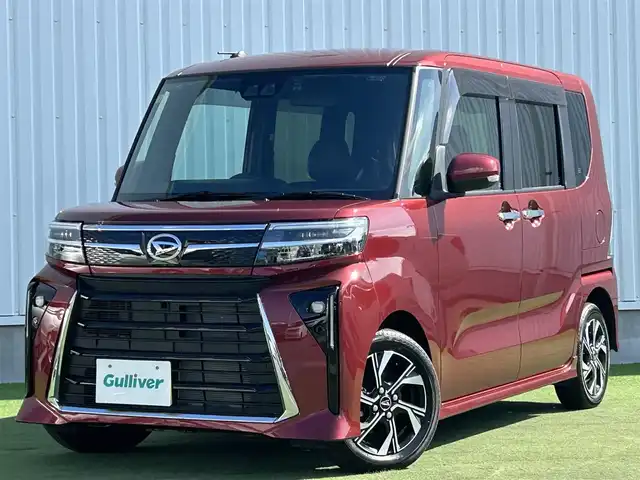 ダイハツ タント カスタム X 香川県 2023(令5)年 0.7万km ファイアークォーツレッドM 登録時走行距離：6138km/スマートアシスト/→衝突回避支援ブレーキ/→車線逸脱警報機能/→先行車発進お知らせ機能/純正7型ナビ/→ＣＤ／ＤＶＤ/→フルセグTV/バックカメラ/両側パワースライドドア/ハーフレザーシート/前席シートヒーター/ステアリングリモコン/LEDヘッドライト/オートライト/ドライブレコーダー/純正14インチアルミホイール/純正フロアマット/スマートキー/プッシュスタート/電動格納ウィンカーミラー/バイザー
