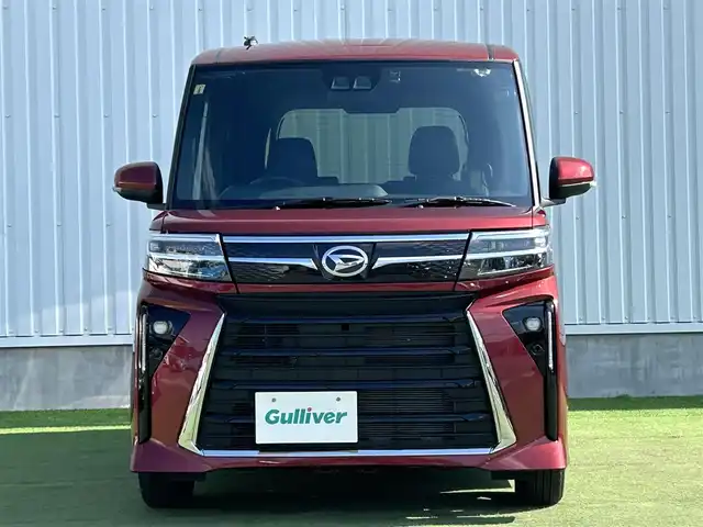 ダイハツ タント カスタム X 香川県 2023(令5)年 0.7万km ファイアークォーツレッドM 登録時走行距離：6138km/スマートアシスト/→衝突回避支援ブレーキ/→車線逸脱警報機能/→先行車発進お知らせ機能/純正7型ナビ/→ＣＤ／ＤＶＤ/→フルセグTV/バックカメラ/両側パワースライドドア/ハーフレザーシート/前席シートヒーター/ステアリングリモコン/LEDヘッドライト/オートライト/ドライブレコーダー/純正14インチアルミホイール/純正フロアマット/スマートキー/プッシュスタート/電動格納ウィンカーミラー/バイザー