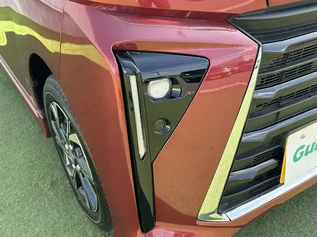 ダイハツ タント カスタム X 香川県 2023(令5)年 0.7万km ファイアークォーツレッドM 登録時走行距離：6138km/スマートアシスト/→衝突回避支援ブレーキ/→車線逸脱警報機能/→先行車発進お知らせ機能/純正7型ナビ/→ＣＤ／ＤＶＤ/→フルセグTV/バックカメラ/両側パワースライドドア/ハーフレザーシート/前席シートヒーター/ステアリングリモコン/LEDヘッドライト/オートライト/ドライブレコーダー/純正14インチアルミホイール/純正フロアマット/スマートキー/プッシュスタート/電動格納ウィンカーミラー/バイザー