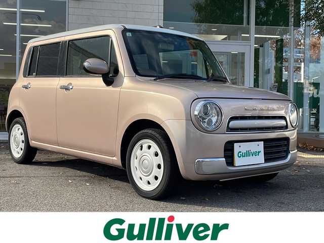 スズキ ラパン ショコラ X 鳥取県 2013(平25)年 5.6万km シャンパンピンクパール/メタリックホワイト ホワイトルーフ/専用インテリア/・合皮シート/本革巻ステアリング/KENWOOD彩速ナビ【MDV-Z701】/・フルセグ/Bluetooth/CD/DVD/バックカメラ/スマートキー/プッシュスタート/ETC/前後ドライブレコーダー/ABS/セキュリティアラーム/オートライト/キセノンヘッドライト/Wエアバック