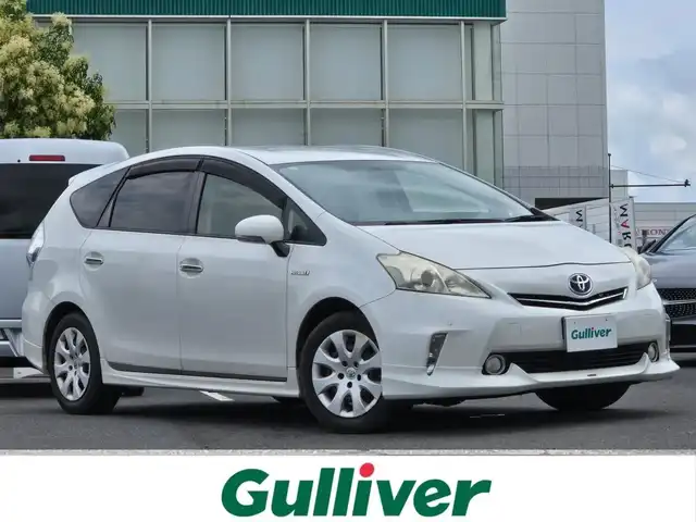 トヨタ プリウス α S Lセレクション 鹿児島県 2013(平25)年 14.8万km ホワイトパールクリスタルシャイン モデリスタエアロ　/社外ＳＤナビ（ＮＸ６１２）　/バックカメラ　/フルセグテレビ　/Ｃｌａｚｚｉｏレザーシートカバー　/前後コーナーセンサー　/プッシュスタート／スマートキー　/車両接近通報装置/エアバッグ(W+サイド)/カーテンエアバッグ/ハロゲンヘッドライト