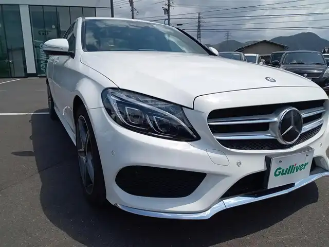 メルセデス・ベンツ Ｃ２００ アバンギャルド AMGライン 福井県 2014(平26)年 4.9万km ポーラホワイト ワンオーナー車/純正18インチAW/本革シート/前席パワーシート/電動トランクリッド/パドルシフト/前後コーナーセンサー/クルーズコントロール/LEDヘッドライト/Rフォグ/バックカメラ/純正HDDナビ/フルセグテレビ/横滑り防止装置/盗難防止装置/アイドリングストップ/純正フロアマット/スマートキー