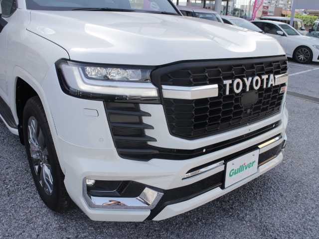 トヨタ ランドクルーザー AX 千葉県 2023(令5)年 0.1万km未満 ホワイトパールクリスタルシャイン ＧＲグリル/ＺＸルック/サンルーフ/純正１２．３型ナビ/AM/FM/Bluetooth/USB/Miracast/全方位カメラ/ブラインドスポットモニター(BSM)/レーダークルーズコントロール/衝突軽減ブレーキ/ＬＥＤヘッドライト/オートハイビーム/オートライト/AC100V電源/取扱説明書　/保証書