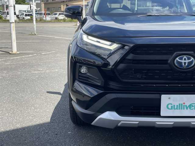 トヨタ ＲＡＶ４ ハイブリッド アドベンチャー 青森県 2024(令6)年 0.7万km アティチュードブラックマイカ 純正ディスプレイオーディオ/TV/BT/前後ドライブレコーダー/ETC2.0/バックカメラ/パノラミックビューモニター/クルーズコントロール（追従有）/ハイビームアシスト/オートライト/パワーリヤゲート/ステアリングヒーター/前席エアシート/レザーシート/トヨタセーフティセンス/D席シートメモリ/純正フロアマット
