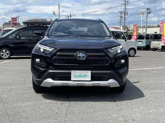 トヨタ ＲＡＶ４ ハイブリッド アドベンチャー 青森県 2024(令6)年 0.7万km アティチュードブラックマイカ 純正ディスプレイオーディオ/TV/BT/前後ドライブレコーダー/ETC2.0/バックカメラ/パノラミックビューモニター/クルーズコントロール（追従有）/ハイビームアシスト/オートライト/パワーリヤゲート/ステアリングヒーター/前席エアシート/レザーシート/トヨタセーフティセンス/D席シートメモリ/純正フロアマット