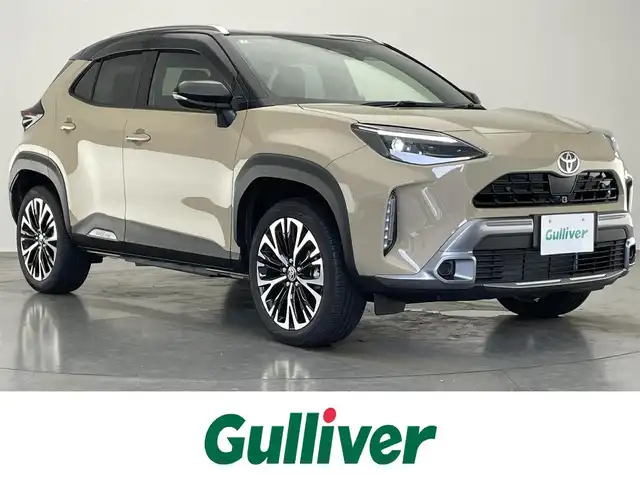 トヨタ ヤリスクロス ハイブリッド Z アドベンチャー 愛知県 2025(令7)年 0.2万km ブラックマイカ/ベージュ 2トーン 純正８型ＤＡナビ　全方位カメラ　禁煙車　フルセグＴＶ　電動リヤゲート　ステアリングヒーター　セーフティセンス　衝突軽減　追従クルコン　オートハイビーム　ＬＥＤライト　ＥＴＣ　純正ドラレコ　シートヒータ/ワンオーナー/純正メーカーナビ（TV/BT/AM/FM)/レーダークルーズコントロール/コーナーセンサー/パワーバックドア/パノラミックビューモニター/バックカメラ/フロントカメラ/サイドカメラ/パワーシート/シートヒーター/ステアリングヒーター/ルーフレール/ビルトインETC/ブレーキホールド/ドライブモード（ECO・ノーマル・Power）/LEDヘッドライト/オートハイビーム/オートライト/ウインカーミラー/純正アルミホイール/オートエアコン/プッシュスタートボタン/ドアバイザー/スマートキー/横滑り防止装置/盗難防止装置/衝突被害軽減システム