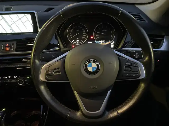 ＢＭＷ Ｘ１ 埼玉県 2016(平28)年 5万km 紺 インテリジェントセーフティ/ハーフレザーシート/純正ナビ/バックカメラ/パワーバックドア/LEDヘッドライト/純正18インチアルミ/PDC/ETC/プッシュスタート/スマートキー/保証書付整備手帳/取扱説明書