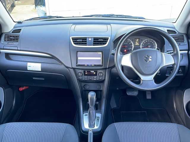 スズキ スイフト XG 富山県 2013(平25)年 5.9万km スノーホワイトパール 禁煙車/社外ＳＤナビ/バックカメラ/フルセグＴＶ/CD・DVD/純正フロアマット/ハロゲンヘッドライト/スマートキー/プッシュスタート/盗難防止装置/横滑り防止装置/電動格納ミラー/パワーウィンドウ