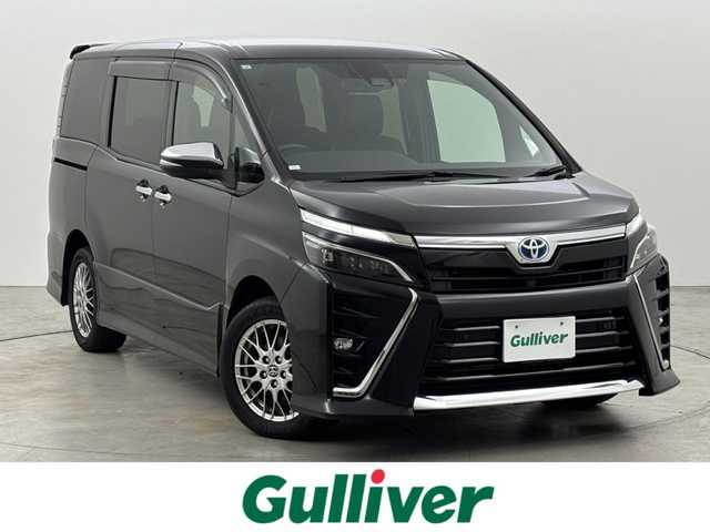 トヨタ ヴォクシー ハイブリッド ZS 煌Ⅲ 福岡県 2021(令3)年 5.6万km ブラック 純正１０インチナビ／フルセグＴＶ／ＢＴ　/両側パワースライドドア　/ＥＴＣ　/ドライブレコーダー　/バックカメラ　/クルーズコントロール　/衝突被害軽減システム　/レーンキープ　/コーナーセンサー　/シートヒーター