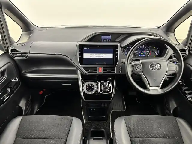 トヨタ ヴォクシー ハイブリッド ZS 煌Ⅲ 福岡県 2021(令3)年 5.6万km ブラック 純正１０インチナビ／フルセグＴＶ／ＢＴ　/両側パワースライドドア　/ＥＴＣ　/ドライブレコーダー　/バックカメラ　/クルーズコントロール　/衝突被害軽減システム　/レーンキープ　/コーナーセンサー　/シートヒーター