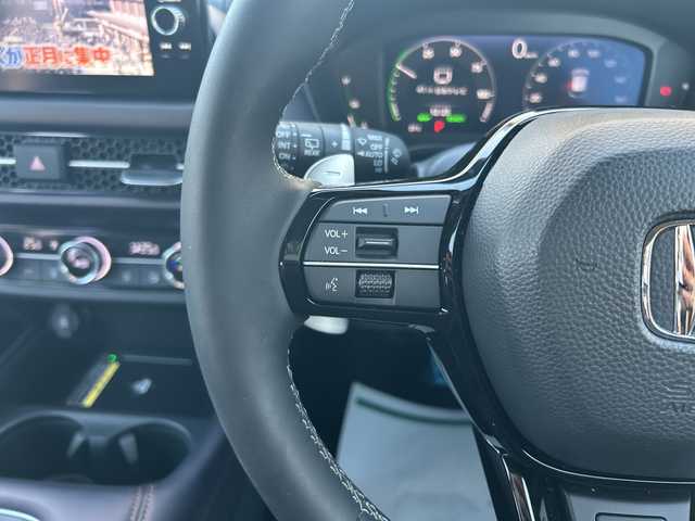 ホンダ ＺＲ－Ｖ ハイブリッド e:HEV Z 東京都 2024(令6)年 0.7万km クリスタルブラックパール ワンオーナー/Honda SENSING/・衝突軽減ブレーキ/・先行車発進お知らせ機能/・歩行者事故低減ステアリング/・路外逸脱抑制機能/・標識認識機能/・渋滞追従機能付アダプティブクルーズコントロール/・車線維持支援システム/・トラフィックジャムアシスト/・ブラインドスポットインフォメーション/・誤発進抑制機能/・後方誤発進抑制機能/・近距離衝突軽減ブレーキ/・パーキングセンサーシステム/・後退出庫サポート（タイプ別設定）/・オートハイビーム/・アダプティブドライビングビーム（タイプ別設定）/レーンアシスト/マルチビューカメラシステム/バックカメラ/Honda CONNECTディスプレー/・Bluetooth/TV/USB/Apple CarPlay/Android Auto/BOSEプレミアムサウンドシステム/盗難防止装置/衝突被害軽減システム/横滑り防止装置/ダウンヒルアシストコントロール/コーナーセンサー/純正18インチアルミホイール/電動リアゲート/パワーシート/シートヒーター/ワイヤレス充電器/ETC/取扱説明書/保証書/スペアキー1本