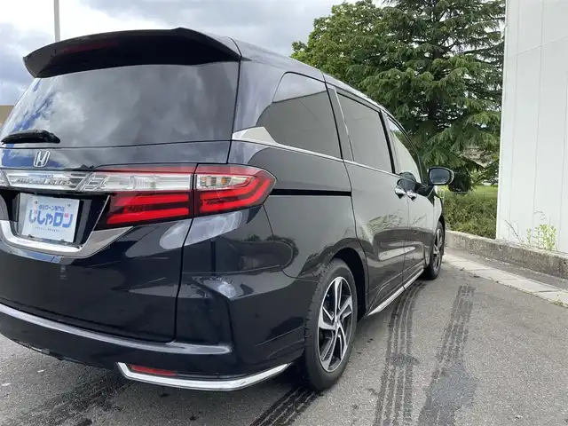 ホンダ オデッセイ アブソルート 福島県 2015(平27)年 12.1万km プレミアムヴィーナスブラックP (株)IDOMが運営する【じしゃロン福島店】の自社ローン専用車両になります。こちらは現金またはオートローンご利用時の価格です。自社ローンご希望の方は別途その旨お申付け下さい/純正ナビ/フルセグテレビ/バックカメラ/ホンダセンシング/レーダークルーズコントロール/レーンキープアシスタント/純正１１インチフリップダウンモニター/ビルトインＥＴＣ/革巻ステアリング/パドルシフト/両側パワースライドドア