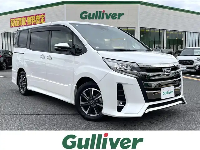トヨタ ノア Si ダブルバイビーⅢ 鳥取県 2021(令3)年 4.5万km ホワイトパールクリスタルシャイン 純正１０型ナビ／ＴＶ／ＤＶＤ／ＣＤ／ＢＴ/バックカメラ/ビルトインＥＴＣ/ドライブレコーダー/純正12.1型フリップダウンモニター/トヨタセーフティセンス/クルーズコントロール/レーンキープアシスト/両側パワースライド/ＬＥＤヘットライト/フォグライト/プッシュエンジンスタート/ハーフレザーシート/純正16インチアルミホイール/オートライト/フロアマット・バイザー