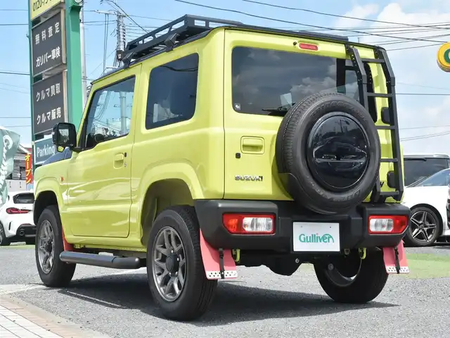 スズキ ジムニー XC 神奈川県 2023(令5)年 0.1千km キネティックイエロー/ブラックトップ2トーン ルーフキャリア/リアラダー/サイドガード/社外ナビ/フルセグテレビ/Bluetooth/クルーズコントロール/プッシュスタート/スマートキー/シートヒーター/保証書/取説/スペアスマートキー