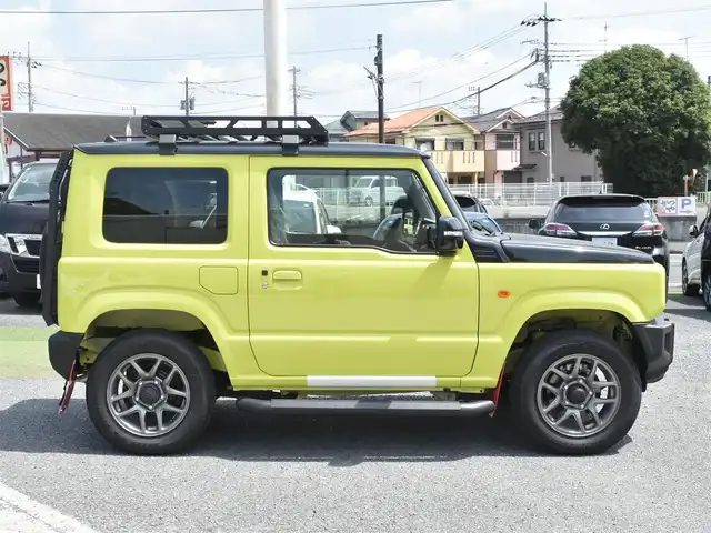 スズキ ジムニー XC 神奈川県 2023(令5)年 0.1千km キネティックイエロー/ブラックトップ2トーン ルーフキャリア/リアラダー/サイドガード/社外ナビ/フルセグテレビ/Bluetooth/クルーズコントロール/プッシュスタート/スマートキー/シートヒーター/保証書/取説/スペアスマートキー