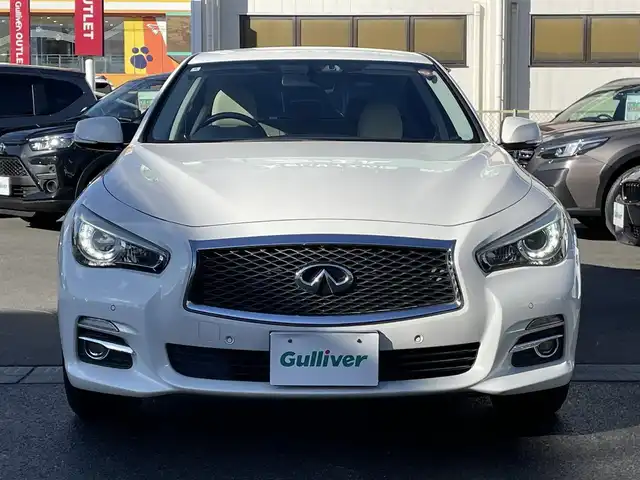 日産 スカイライン 200GT－t タイプP 群馬県 2014(平26)年 5.9万km クリスタルホワイトパール 安全装備/・衝突軽減ブレーキ/・オートライト/・レーンキープアシスト/・クリアランスソナー/・アラウンドビューモニター/・クルーズコントロール/・ブラインドスポット/・横滑り防止/メーカー純正ナビ/・AM/FM/フルセグTV/・Bluetooth/USB/MSV/LEDヘッドライト/LEDフォグランプ/前席シートヒーター/シートメモリー/前席パワーシート/ETC/純正フロアマット/スマートキー/プッシュスタート