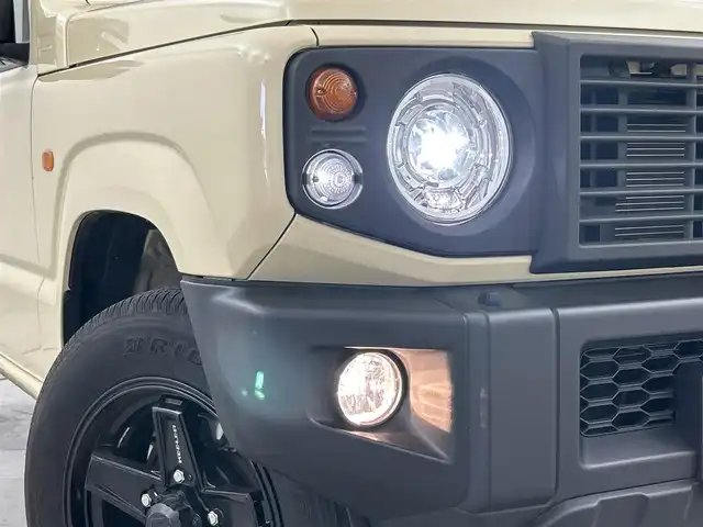 スズキ ジムニー XC 福岡県 2023(令5)年 1.3万km シフォンアイボリーM 社外８型ナビ　/バックカメラ　/前後ドラレコ　/デジタルルームミラー　/ＥＴＣ　/ルーフラック　/クルーズコントロール　/衝突軽減ブレーキ　/レーンキープ　/ヒルディセントコントロール　/シートヒーター　/純正ＡＷ積込み有