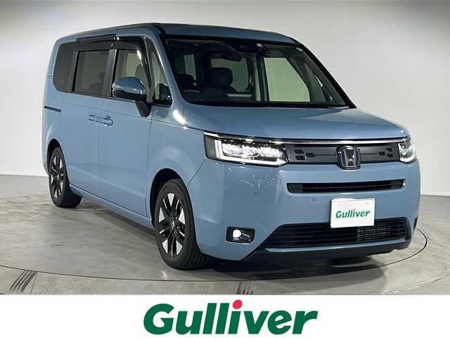 ホンダ ステップワゴン eHEV エアー 福岡県 2022(令4)年 2.6万km ハーバードブルーパール ・フルセグTV/・フリップダウン/・Bluetooth/・純正ナビ/・16インチ純正ホイール/・ACC/・Bカメラ/・プッシュスタート/・スマートキー/・ETC/・両側パワースライドドア/・HDMI/・ドラレコ