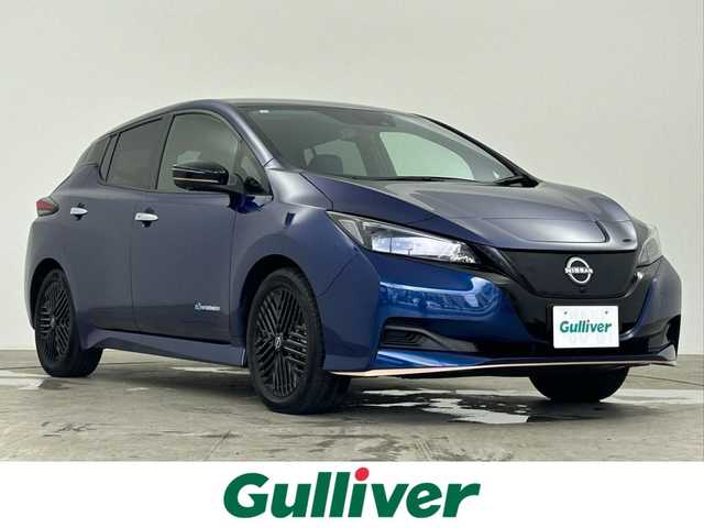 日産 リーフ X Vセレクション 90周年記念車 千葉県 2023(令5)年 0.4万km オーロラフレアブルーパール 禁煙車/プロパイロット/アラウンドビューモニター/インテリジェントルームミラー/車線逸脱防止支援/ふらつき警報/純正9インチナビ/レーダークルーズコントロール/LEDオートライト/ハーフレザーシート/シートヒーター/純正17インチアルミホイール/オートエアコン/USBポート/プッシュスタート/スマートキー