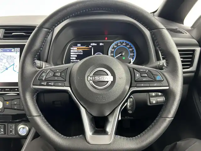 日産 リーフ X Vセレクション 90周年記念車 千葉県 2023(令5)年 0.4万km オーロラフレアブルーパール 禁煙車/プロパイロット/アラウンドビューモニター/インテリジェントルームミラー/車線逸脱防止支援/ふらつき警報/純正9インチナビ/レーダークルーズコントロール/LEDオートライト/ハーフレザーシート/シートヒーター/純正17インチアルミホイール/オートエアコン/USBポート/プッシュスタート/スマートキー