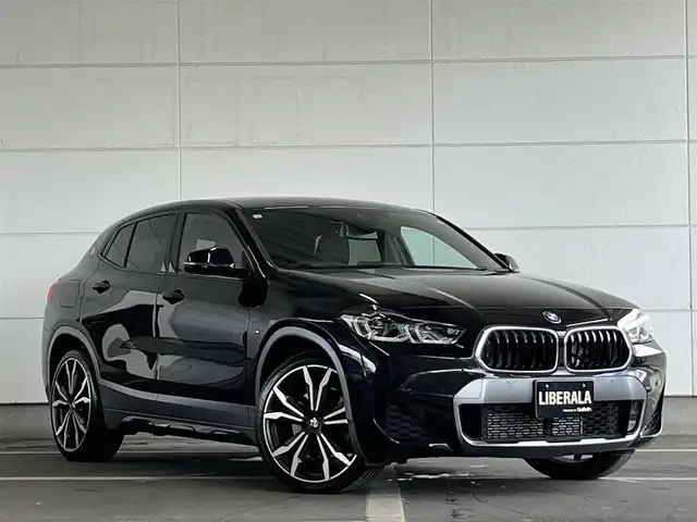 ＢＭＷ Ｘ２ xDrive 20d MスポーツX 山形県 2023(令5)年 2.3万km サファイアブラックP ワンオーナー/4WD/インテリジェントセーフティ/・衝突警告/歩行者警告/車線逸脱警告/ヘッドアップディスプレイ/純正ナビ/・Bluetooth/USB/バックカメラ/パークディスタンスコントロール/走行モード/ブラウンレザーシート/シートヒーターD/N席/パドルシフト/アダプティブクルーズコントロール/レーンディパーチャーウォーニング/純正LEDオートライト/ワイヤレスチャージング/ヒルディセントコントロール/オプション20インチAW/パワーバックドア/フットオープナー