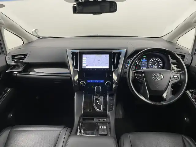 トヨタ アルファードハイブリット SR Cパッケージ 埼玉県 2015(平27)年 9万km ホワイトパールクリスタルシャイン 社外ディスプレイオーディオ　フリップダウンモニター　黒レザー　バックカメラ　ビルトインＥＴＣ　前後ドラレコ　セーフティセンス　レーダークルーズ　メモリシート　シートヒーター　ＡＣ１００Ｖ　ＬＥＤライト