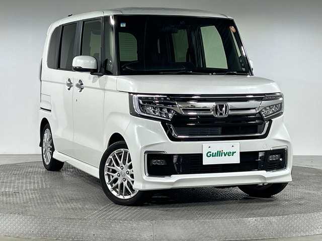 ホンダ Ｎ ＢＯＸ カスタム L ターボ 神奈川県 2021(令3)年 1.6万km プラチナホワイトパール ホンダセンシング/純正7型ナビ/・BT/フルセグTV/CD/DVD/SD/USB/バックカメラ/両側電動スライドドア/ビルトインETC/コーナーセンサー/ヘッドライトレベライザー/スマートキー/プッシュスタートボタン/LEDヘッドライト/フォグランプ/革巻きステアリング/ステアリングスイッチ/パドルシフト/Autoライト/ハーフレザーシート/シートヒーター(D/N)/シートリフター/純正純正フロアマット/純正アルミホイール