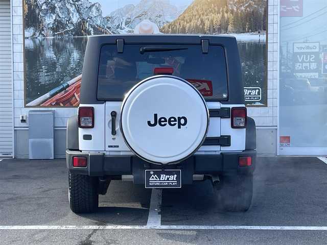 クライスラー・ジープ ジープ ラングラー アンリミテッド スポーツ 長野県 2016(平28)年 12.1万km ブライトホワイト ４WDワンオーナー/記録簿9枚（メンテナンスノート内含む）/カラーコード：PW7/積込純正ホイール・サマータイヤ4本/カロッツェリアナビ/フルセグTV/Bluetooth/バックカメラ・左側サイドカメラ/ETC/革巻きステアリング/MTモード付オートマ/クルーズコントロール/横滑り防止/リモコンキー/スペアキー/取扱説明書/保証書