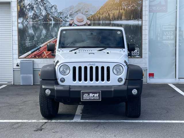 クライスラー・ジープ ジープ ラングラー アンリミテッド スポーツ 長野県 2016(平28)年 12.1万km ブライトホワイト ４WDワンオーナー/記録簿9枚（メンテナンスノート内含む）/カラーコード：PW7/積込純正ホイール・サマータイヤ4本/カロッツェリアナビ/フルセグTV/Bluetooth/バックカメラ・左側サイドカメラ/ETC/革巻きステアリング/MTモード付オートマ/クルーズコントロール/横滑り防止/リモコンキー/スペアキー/取扱説明書/保証書