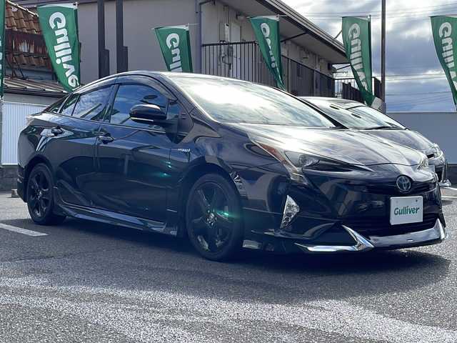 トヨタ プリウス A プレミアム 岡山県 2017(平29)年 9.1万km プレシャスブラックパール 登録時走行距離91010キロ/9インチALPINEナビ（X9S）/AM/FM/TV/Bluetooth/CD/サンルーフ/モデリスタエアロ（F、S、R）/Toyota Safety Sense/・プリクラッシュセーフティ/・レーダークルーズコントロール/・レーンディパーチャーアラート/パーキングアシスト/クリアランスソナー/ブラインドスポットモニター/ヘッドアップディスプレイ/純正17インチAW/純正フロアマット/バックカメラ/パワーシート（D）/シートヒーター（D＋N）/プッシュスタート/スマートキー/ビルトインETC