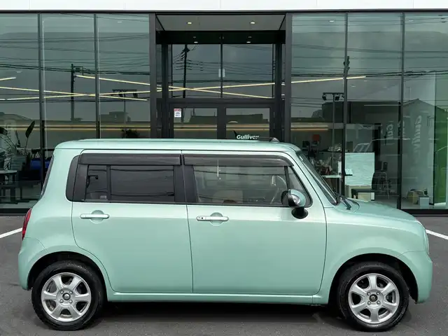 スズキ ラパン XL 栃木県 2015(平27)年 8.6万km フォレストアクアメタリック 車検期限令和8年2月22日まで/運転席シートヒーター/社外ナビ/ワンセグTV走行中視聴可/アイドリングストップ/ETC車載器/社外14インチAW/スマートキー×2