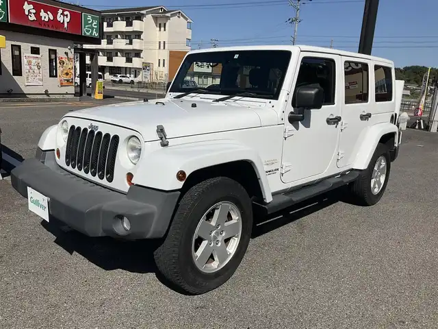 クライスラー・ジープ ジープ ラングラー アンリミテッド サハラ 滋賀県 2012(平24)年 5.7万km 白 ワンオーナー /4WD/純正オーディオ/CD、DVD、ハンズフリー/サイドカメラ/ETC/クルーズコントロール/純正18インチアルミホイール/スペアキー有り/取扱説明書/保証書/