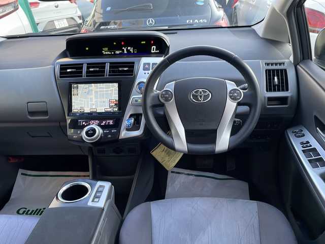 トヨタ プリウス α G 東京都 2012(平24)年 6.5万km グレーメタリック 純正ナビ/FM/AM/BT/USB/HDD/DVD/ブルーレイ/フリップダウンモニター/クルーズコントロール/バックカメラ/フォグランプ/ETC/ハロゲンライト/AUTOライト/ダブルエアバック/カーテンエアバック/サマータイヤ（純正ホイール・キャップ付き）積込