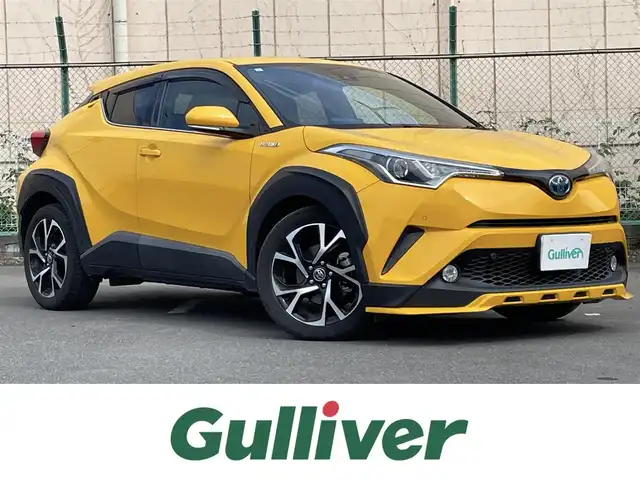 トヨタ Ｃ－ＨＲ G 東京都 2017(平29)年 10.7万km イエロー ワンオーナー/純正ナビ/フルセグ/CD/DVD/AM/FM/BT/追従クルコン/ＬＡＴ/シートヒーター/純正アルミ/ＥＴＣ/純正フロアマット/ＡＣ１００Ｖ/ステアリングスイッチ/ドライブモード/横滑り制御機能/ヘッドライトレベライザー/SRSエアバック（運転席/助手席）/車両接近警報/オートマチックハイビーム/ドアバイザー
