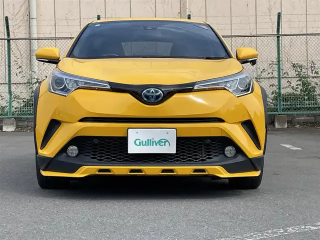 トヨタ Ｃ－ＨＲ G 東京都 2017(平29)年 10.7万km イエロー ワンオーナー/純正ナビ/フルセグ/CD/DVD/AM/FM/BT/追従クルコン/ＬＡＴ/シートヒーター/純正アルミ/ＥＴＣ/純正フロアマット/ＡＣ１００Ｖ/ステアリングスイッチ/ドライブモード/横滑り制御機能/ヘッドライトレベライザー/SRSエアバック（運転席/助手席）/車両接近警報/オートマチックハイビーム/ドアバイザー