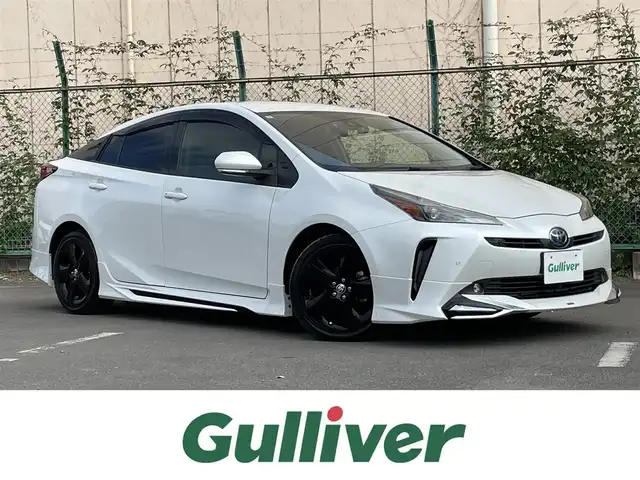 トヨタ プリウス S ツーリングセレ ブラックED 東京都 2021(令3)年 4.8万km プラチナホワイトパールマイカ 純正8インチナビ/モデリスタエアロ（フロント、サイド、リア）/純正17インチアルミホイール/バックカメラ/アダプティブクルーズコントロール/100V充電/HDMI/Bluetooth/フルセグテレビ/前後ドライブレコーダー/純正フロアマット/レザーシート/シートヒーター/オートライト/オートマチックハイビーム