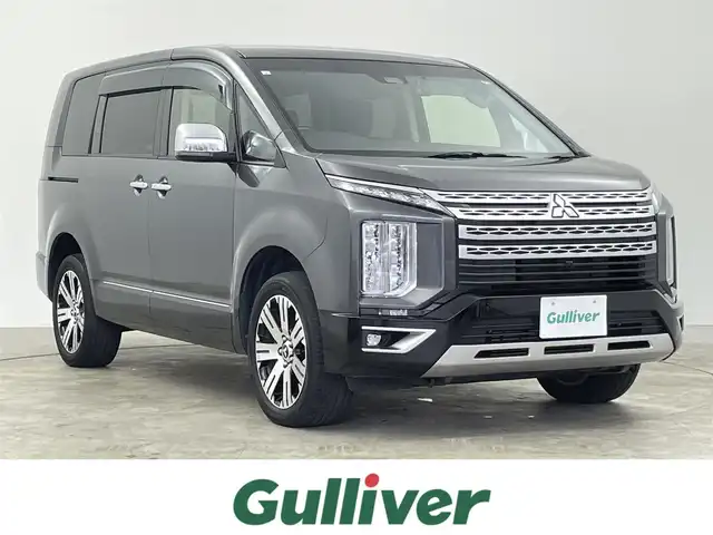 三菱 デリカＤ：５ P 千葉県 2021(令3)年 4.9万km アイガーグレーM/ダイヤモンドブラックマイカ 禁煙車/両側パワースライドドア/4WD/純正11インチアルパインナビ/・フルセグTV/CD/DVD/Bluetooth/・バックカメラ/・全方位カメラ/純正フリップダウンモニター/助手席側電動サイドステップ/衝突被害軽減ブレーキシステム/車線逸脱警報システム/レーダークルーズコントロールシステム/後側方車両検知システム/オートマチックハイビーム/後退時車両検知警報システム/誤発進抑制機能（前進時）/パワーシート/シートヒーター/ステアリングヒーター/電動パーキング/オートホールドブレーキ/アイドリングストップ/パドルシフト/電動リアゲート/ETC/LEDオートヘッドライト/純正18インチアルミホイール/プッシュスタート/スマートキー/スペアキー1本