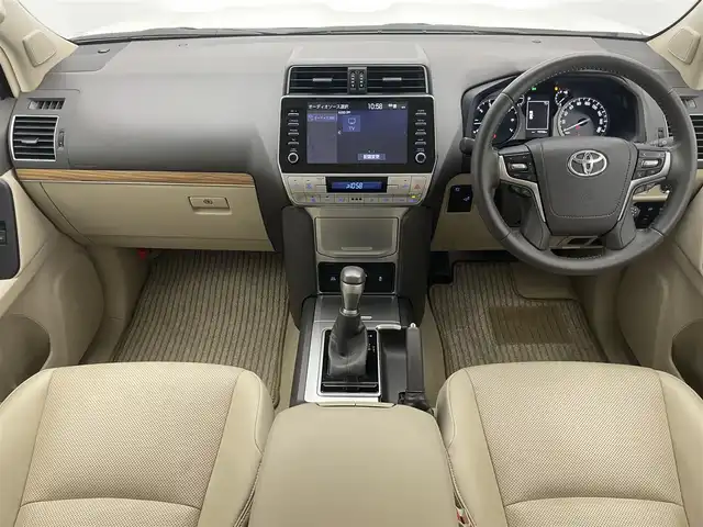 トヨタ ランドクルーザー プラド TX Lパッケージ 愛知県 2023(令5)年 2万km ホワイトパールクリスタルシャイン 純正８型ＤＡナビ　ムーンルーフ　全方位カメラ　禁煙　ＥＴＣ２．０　ベージュ革　ベンチレーション　シートヒーター　セーフティセンス　衝突軽減　追従クルコン　ＬＥＤオートライト　ＢＳＭ　ルーフレール