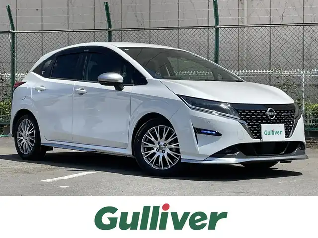 日産 ノート オーテック 東京都 2021(令3)年 2.5万km ピュアホワイトパール 純正ナビ/アラウンドビューモニター/インテリジェントルームミラー/エマージェンシーブレーキ/車線逸脱警報/プロパイロット/ソナー/ＥＴＣ/ワイヤレス充電器/ドライブレコーダー/スマートキー