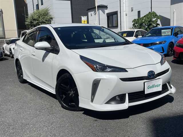 トヨタ プリウス A プレミアム　ツーリングセレ 神奈川県 2021(令3)年 5.4万km プラチナホワイトパールマイカ 純正ナビ（AM/FM/BT）/フルセグTV/全方位カメラ/パーキングアシスト/レザーシート/D席パワーシート　/前席ベンチレーション・シートヒーター/AC100V電源/前後ドラレコ/衝突軽減/コーナーセンサー/BSM/ヘットライトディスプレイ/ETC2.0/ドアバイザー/LEDヘットライト/ディーラー記録（R4.R5.R6.R7）/取説・保証書・記録簿/スペアキー/純正17インチアルミ/純正エアロ（フロント・リア）