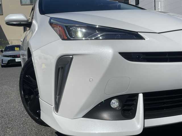 トヨタ プリウス A プレミアム　ツーリングセレ 神奈川県 2021(令3)年 5.4万km プラチナホワイトパールマイカ 純正ナビ（AM/FM/BT）/フルセグTV/全方位カメラ/パーキングアシスト/レザーシート/D席パワーシート　/前席ベンチレーション・シートヒーター/AC100V電源/前後ドラレコ/衝突軽減/コーナーセンサー/BSM/ヘットライトディスプレイ/ETC2.0/ドアバイザー/LEDヘットライト/ディーラー記録（R4.R5.R6.R7）/取説・保証書・記録簿/スペアキー/純正17インチアルミ/純正エアロ（フロント・リア）