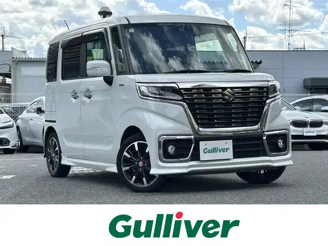スズキ スペーシア カスタム HYBRID XS ターボ 奈良県 2020(令2)年 5.9万km ピュアホワイトP 純正ナビ/両側パワスラ/ハーフレザー/ターボ付/追従式クルコン/パドルシフト/純正アルミ/シートヒータ/背面テーブル/リアサーキュレーター/ETC/ドラレコ/オートライト（LED）/Bluetooth/バックカメラ/純正フロアマット/フルセグTV/リアサンシェード/保証書/取扱説明書