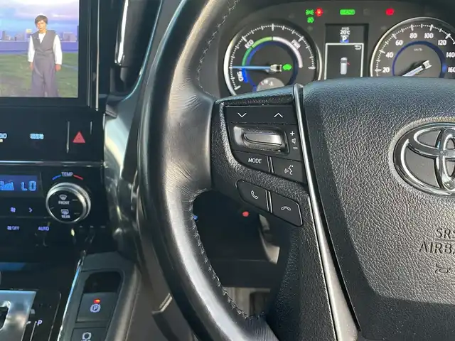 トヨタ ヴェルファイア ハイブリット ZR Gエディション 長野県 2018(平30)年 5.6万km ブラック 純正ナビ（FM、AM、CD、DVD、BT）/フルセグテレビ/バックカメラ/ETC２．０/純正フリップダウンモニター/クルーズコントロール追従有/メモリシート/全席パワーシート/前方ドライブレコーダー/ステアリングヒーター/電動リアゲート/前後コーナーセンサー/衝突軽減システム/純正フルエアロ/横滑り防止装置/両側パワースライドドア/オットマン/１００V充電/純正フロアマット/純正１７AW/LEDオートライト/オートマチックハイビーム/ダブルサイドエアバック/カーテンエアバック/保証書、取扱説明書/スペアキー（１本）